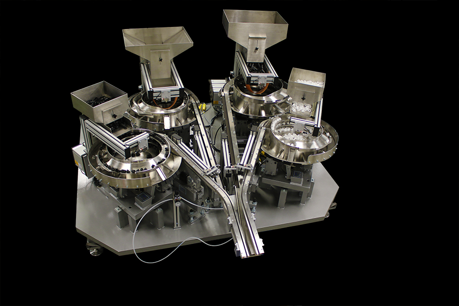 Four-part feeder supplies assembly cell in tight spaces