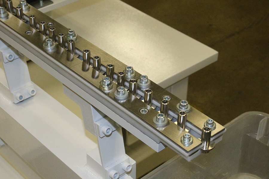 Non-metal-surface-for-sensitive-metal-parts-feeding