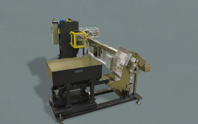 Parts feeder loads and unloads stamping press